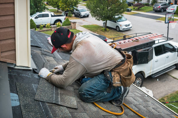 Professional Emergency Roof Repair technician working in Waterport, NY